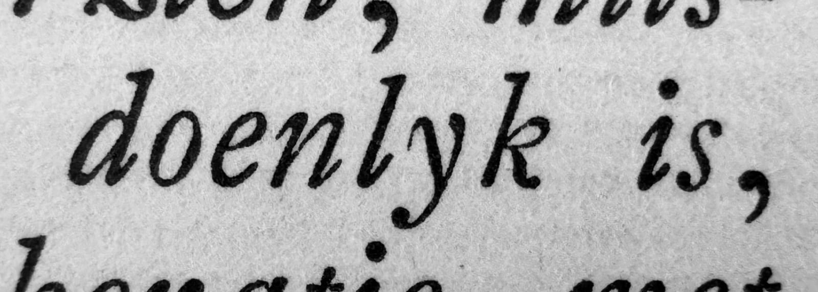 Close-up scan of a word set in an italic type cut by Fleischmann, showing a letter k with a complete loop.